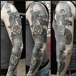 Tattoos - In black and gray tattoo of a snake - 99489